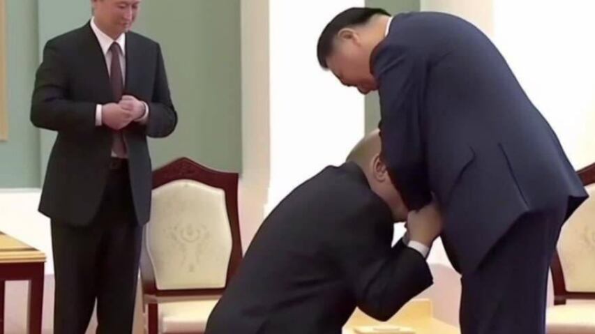Vladimir Putin arrodillándose ante Xi Jinping