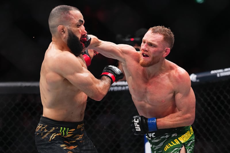 Jack Della Maddalena of Australia punches Belal Muhammad in the UFC welterweight championship.