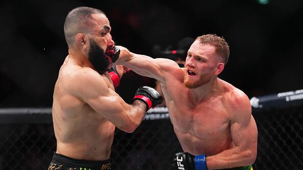 Jack Della Maddalena of Australia punches Belal Muhammad in the UFC welterweight championship.