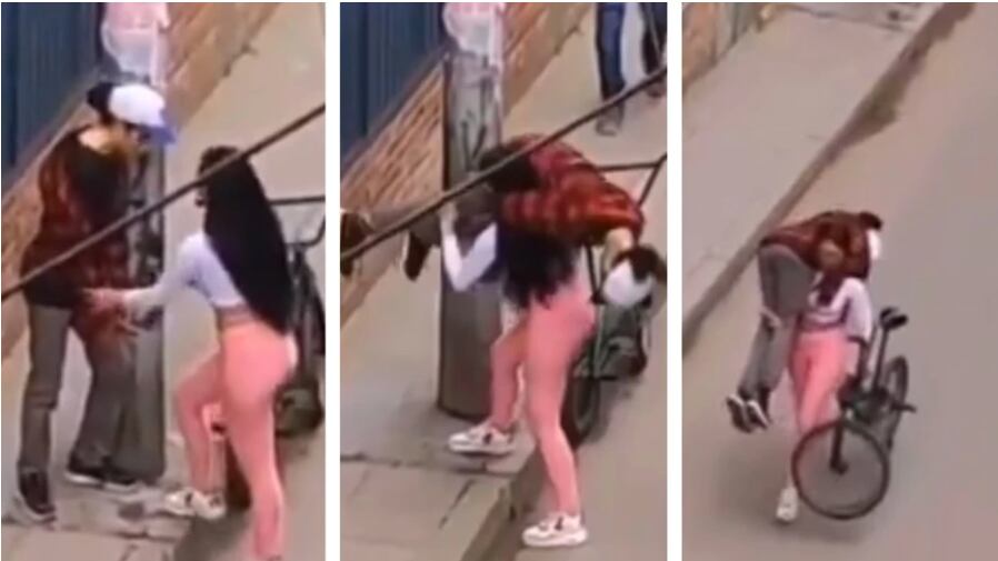 mujer en Bogotá cargó a un joven y una bicicleta al mismo tiempo