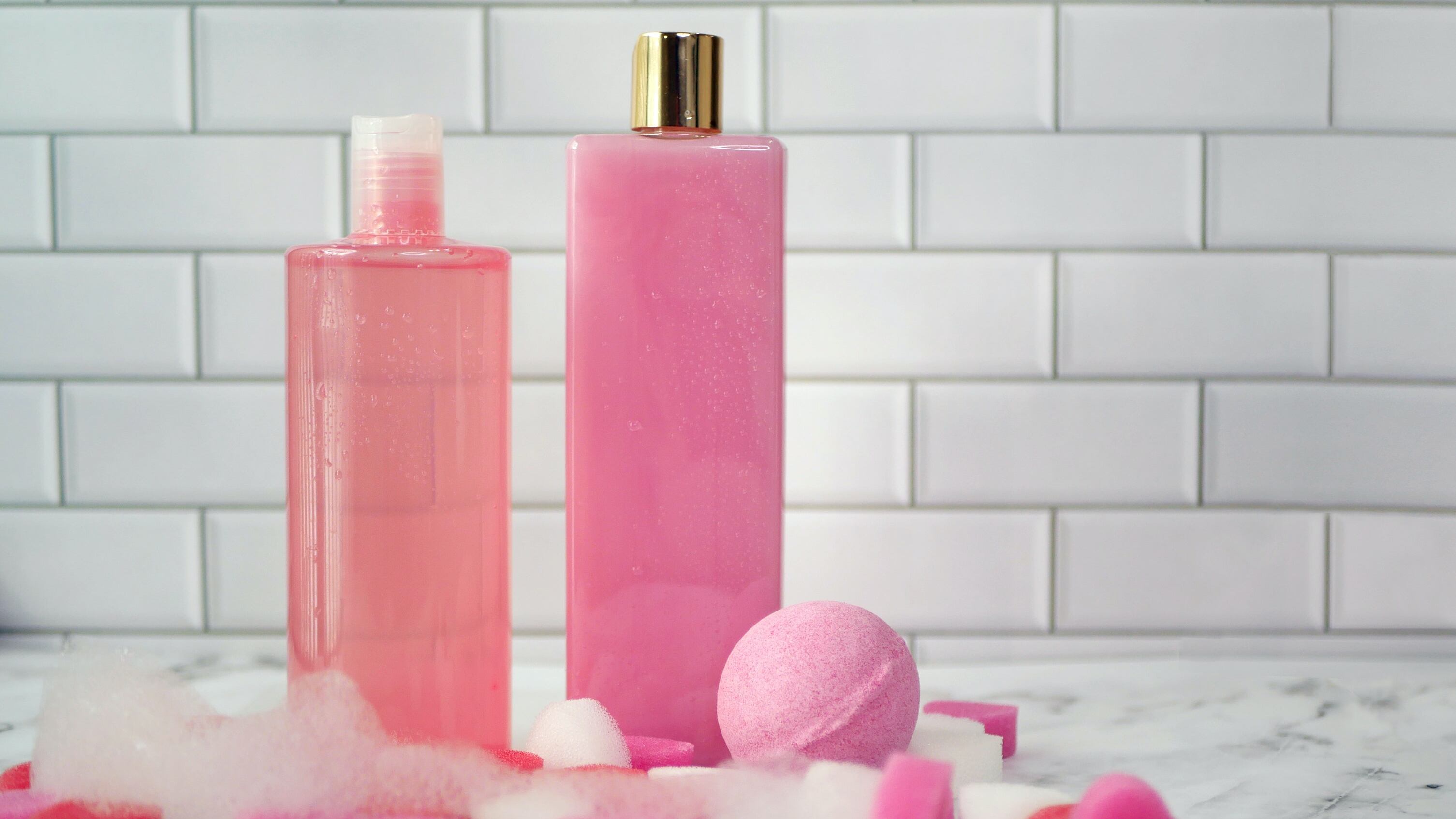 Frasco de perfume rosa