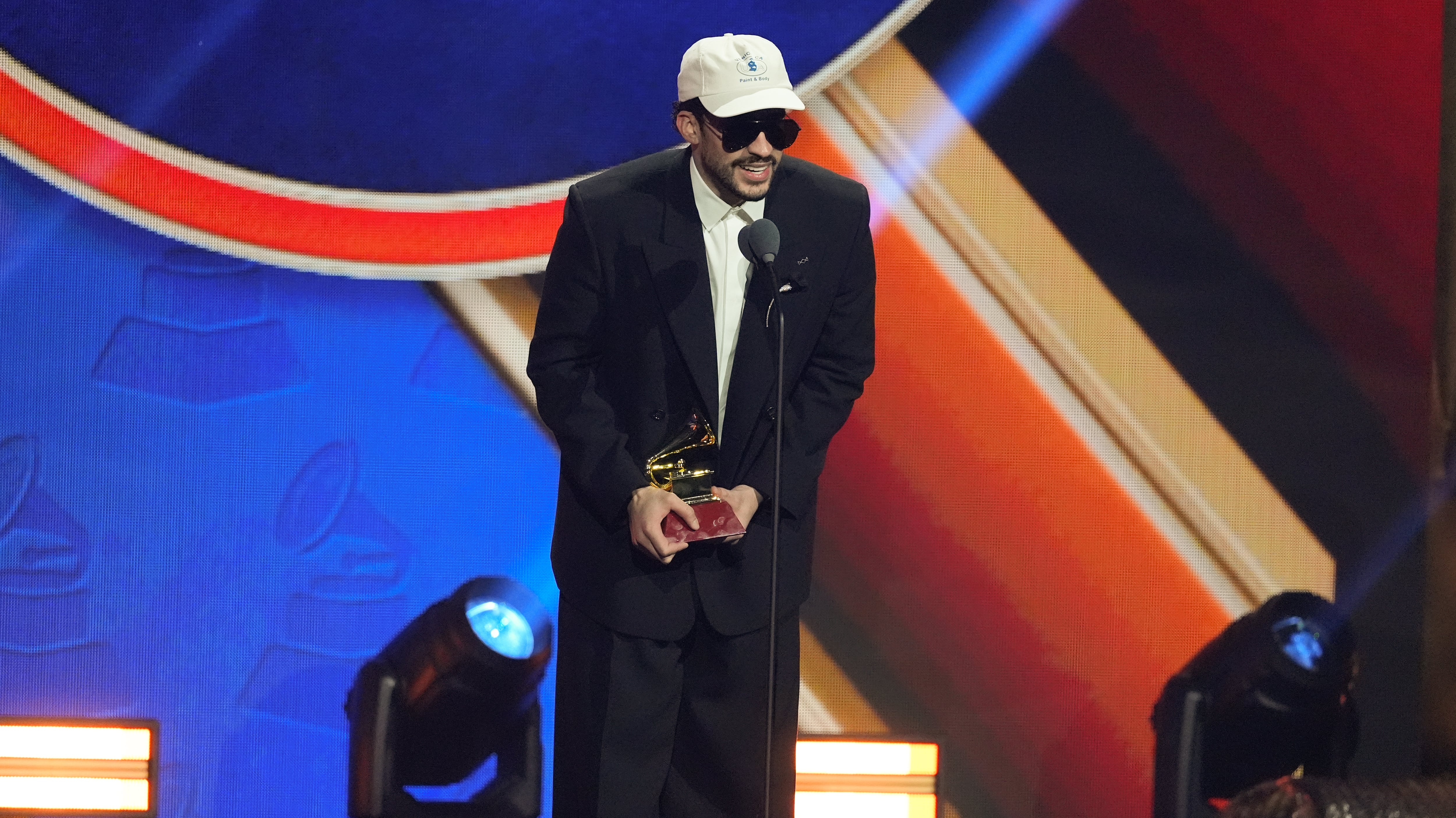 Bad Bunny accepts the award for best urban music album for "DeBí TiRAR MáS FOToS" during the 2025 Latin Grammys on Thursday, Nov. 13, 2025, at MGM Grand in Las Vegas. (AP Photo/Chris Pizzello)