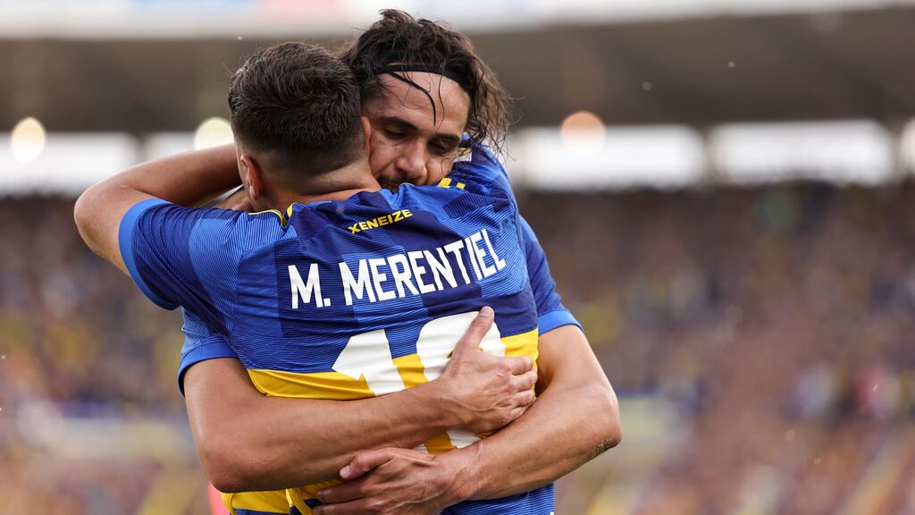 Miguel Merentiel y Edinson Cavani