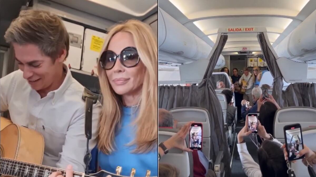 Marta Sánchez y Carlos Baute cantando en el avión