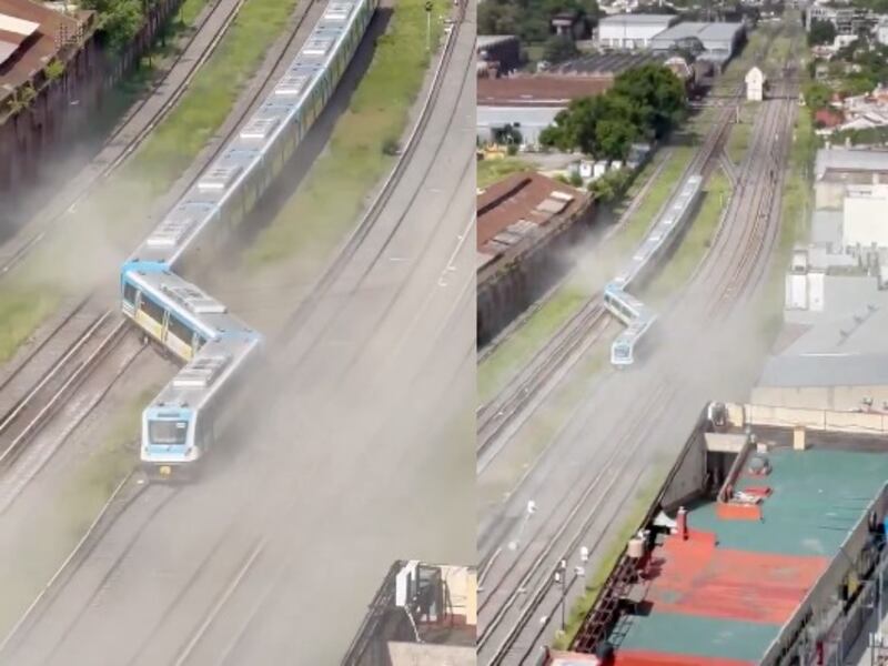 Equipos de emergencia trabajan junto a la formación del tren Sarmiento que se descarriló en Buenos Aires.